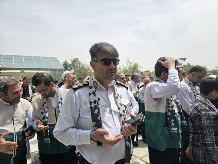 Photos: Holy flag of Imam Ali Shrine raised in Qom