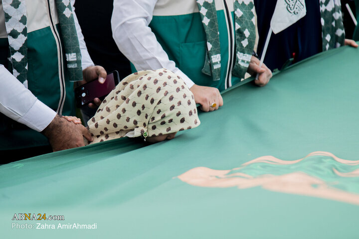 Photos: Ceremony of Raising Largest Blessed Flag of Imam Ali Holy Shrine in Tehran