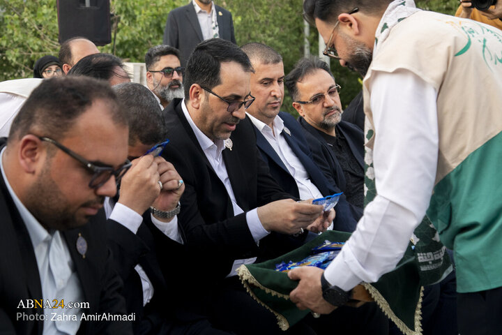 Photos: Ceremony of Raising Largest Blessed Flag of Imam Ali Holy Shrine in Tehran