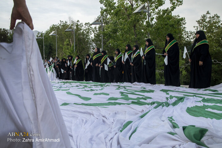 Photos: Ceremony of Raising Largest Blessed Flag of Imam Ali Holy Shrine in Tehran