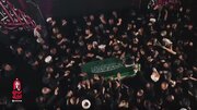 Video: Iraqi Poet Recites Verses Beside Martyr Leader’s Body at Najaf Airport