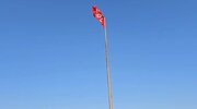 Bandera roja de venganza por el Imam mártir ondea en Irak