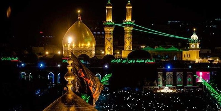 مراسم تعویض پرچم گنبدهای حرمین کربلای معلی برگزار شد