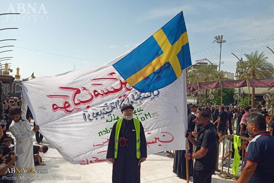 پرچمی که با امضای شیعیان سوئد به کربلای معلی رسید/ برپایی مراسم پیاده روی اربعین در شهر مالمو 